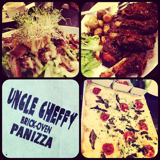 Uncle cheffy's salad, pizza and Memphis BBQ ribs.