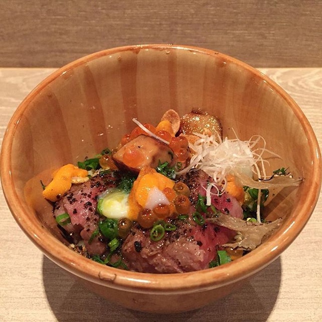 ultimate donburi: kagoshima wagyu, pan seared foie gras, 2 types of uni (thought i tasted bafun and murasaki), ikura, onsen egg, black truffle shavings, truffle oil and fried garlic slices, all atop a bed of fragrant fried rice.
