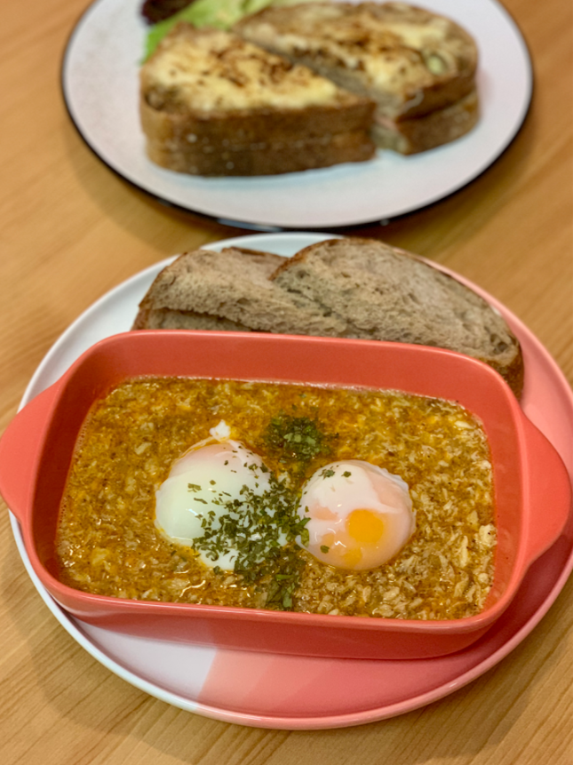 Baked Eggs in Crabmeat Laksa Sauce with Sourdough Bread | $14