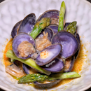 Purple clams with toasted koji and green asparagus