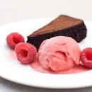 Flourless Chocolate Cake with Berry Sorbet.