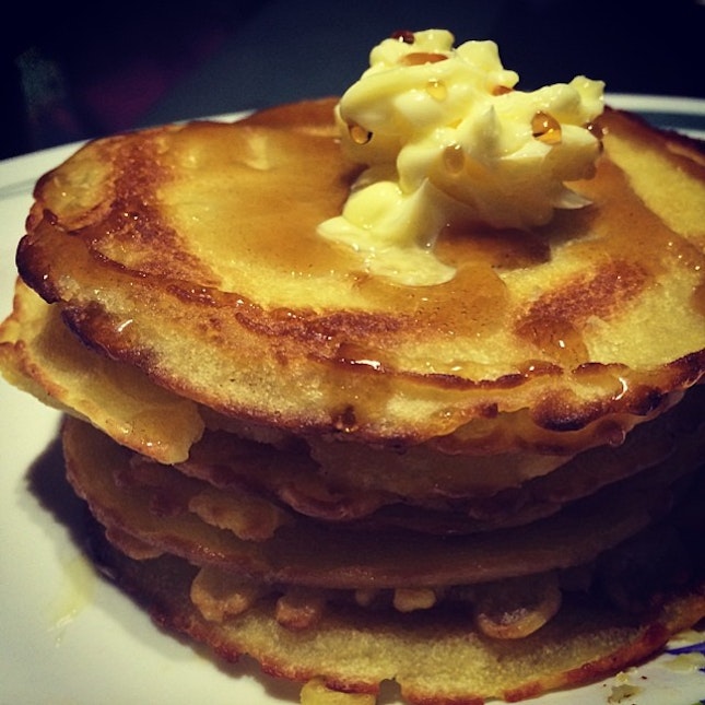 Pancakes for breakfast, with lots of butter and maple syrup.