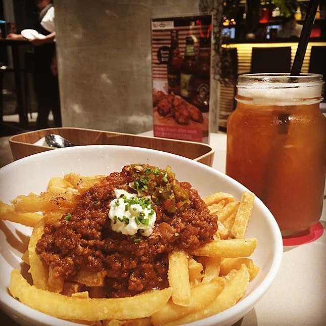 Char Siew Chili Fries ($7)  A twist on the usual chili fries, featuring crispy spuds heaped with homemade char siew ragout with sour cream and feisty jalapeño salsa.