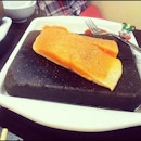 HUGE slab of salmon on a sizzling hot stone, shiok!