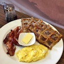 Waffles with Scrambled Eggs and Bacon ($16 nett inclusive of a drink)