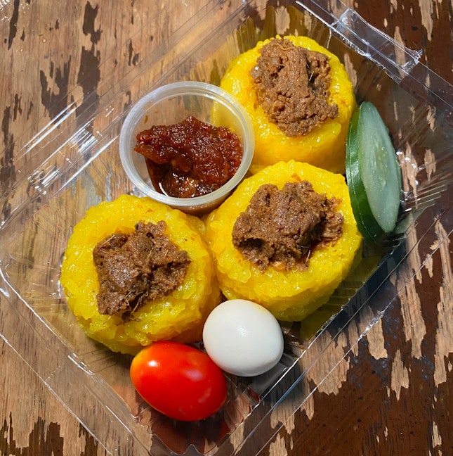 Pulut Kuning with Beef Rendang and Sambal Ikan Bilis ($8)