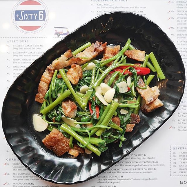 Kang Kong with Crispy Pork Belly •SGD 12 NETT•

Stir fried morning glory with Thai sauces, chilli and garlic, topped with crispy pork belly - a dish that is not commonly seen anywhere.