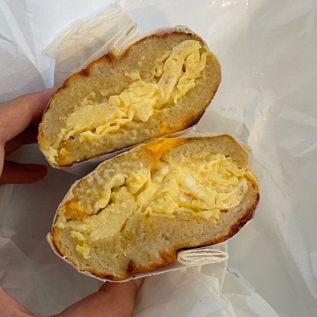Scrambled Egg on Cheddar Bagel ($4)