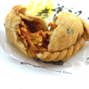 Trying out the Old Chang Kee Chilli crab curry puff.