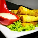 Golden brown Crispy Prawn Twisters, r whole prawns wrapped in popiah skin & deep fried for a solid finish.