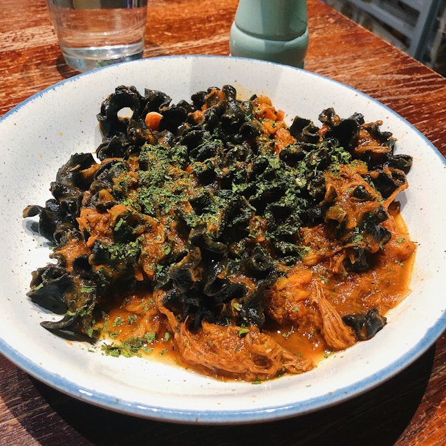 Squid ink mafalde (extra portion of pasta) with beef ragu [$17.50]