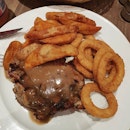 Chargrilled chicken with potato wedges and onion rings ($10.90)!