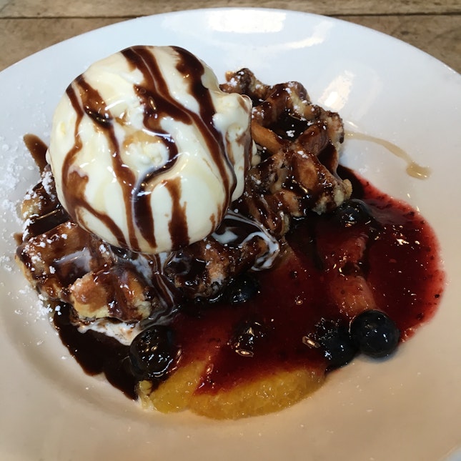 Overly Saccharine Waffle Ice Cream Berry Compote Drenched In Chocolate Sauce