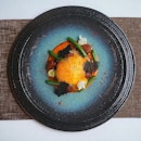 Octopus & Chorizo, topped with a 63 degrees egg and squid ink crisps.