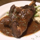 served with mashed potato in mushroom sauce and long beans, the braised lamb shank ($22) at southwest tavern is meltingly tender and intensely savoury.