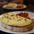 Lobster Omelette | with fresh herbs, served on sourdough and toasted with gruyère cheese