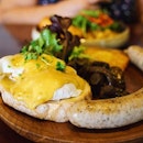 The Tuckshop Breakfast Combo #1 | Poached eggs, mushrooms, jumbo pork sausage, hash brown, dou ban jiang hollandaise, artisanal toast