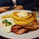 Aussie Sunrise | Two buttermilk pancakes with whipped butter, bacon, an egg and grilled banana and pineapple