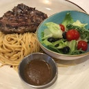 Rib eye steak with pasta and salad from Steak & Sushi by  @hottomatosg @funansg We were surprised by the quality and portion for the affordable price of less than $20!