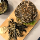 Salmon Mentaiko Charcoal Burger With Fried Fish Skins