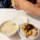 Measly Portioned Pork Congee With Salted Egg