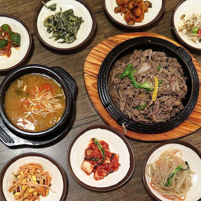 banchan orgy and a steaming bowl of fermented soybean paste stew (jjigae) at only just 8k KRW.