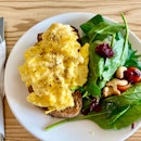 Scrambled Eggs With Toast And Greens ($13.80)