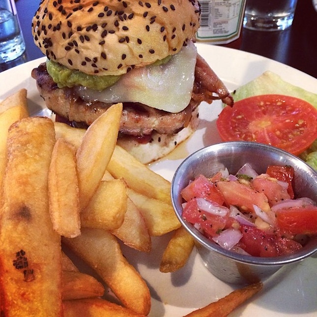 Pork burger (Caramelized Onions, Jalapeño, Mozzarella Cheese, Tomato Salsa, Pickles, Guacamole) #burger #food #foodporn #fat