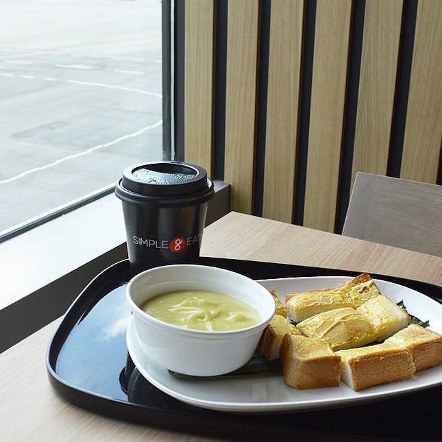 #tbt Thick toast cut into cubes with a bowl of pandan custard & a cup of latte for S$6.