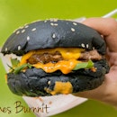 That signature charcoal-ASHY-black burger bun, figured out where yet?