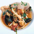 Cacciucco from In ITALY – seafood casserole with lobster, garoupa, prawns, squid, imported mussels, clams, tomatoes and chilli.