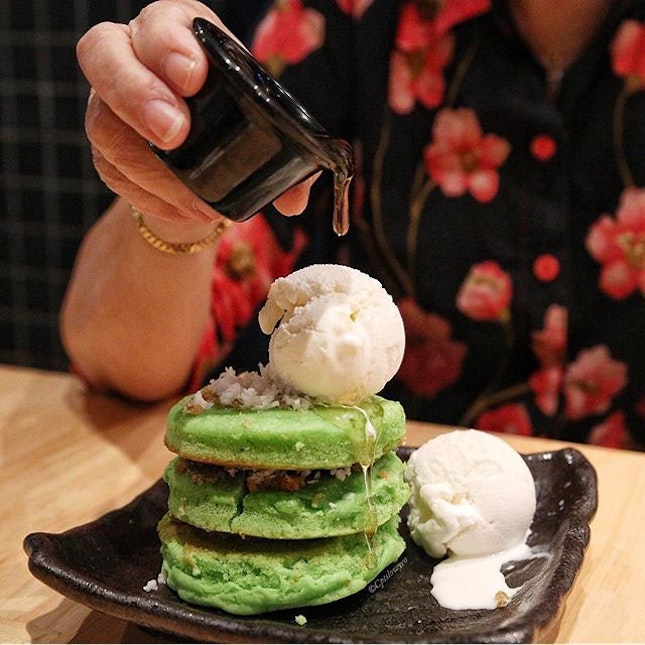 Pandan pancakes $8.50++
🌴 
3 thick and dense pandan pancakes topped with gula Melaka and coconut ice cream, served with honey.