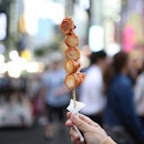 Loving the night market atmosphere here, with sausages and Tteok-bokki wrapped in fish cake!