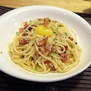 The Roma is a Classic creamless carbonara bacon, parmesan, egg yolk pasta.