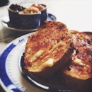 Buttery toast with jam, marmalade and kaya - the perfect local touch - in tiny tea cups.