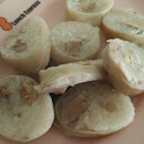 Glutinous rice with chestnut wrapped in pig's intestine.