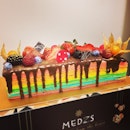 With a Rainbow log cake that looks like that, how much happier can you get?