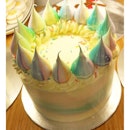 A very beautiful rainbow cake.