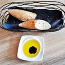 Bread Baguette & Castillo De Canena Arbequina Extra Virgin Olive Oil With Balsamic Vinegar (SGD $Complimentary) @ La Cala.