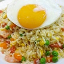Happiness is when you get a perfect Sunny Side Up Egg with your Fried Rice.