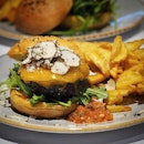 ⭐ District 10 Bar & Grill ~ Black Truffle Wagyu Burger ⭐

Get ready to chomp on District 10's tantalising Black Truffle Wagyu Burger which consists of a thick and deliciously juicy wagyu beef patty, sweet caramelised onions, melty cheddar cheese and fresh wild rocket, served with appetising tomato salsa and crispy D10 fries.