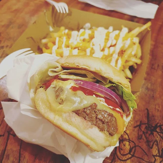 Bacon cheeseburger and cheese fries, @burgerjointsg.