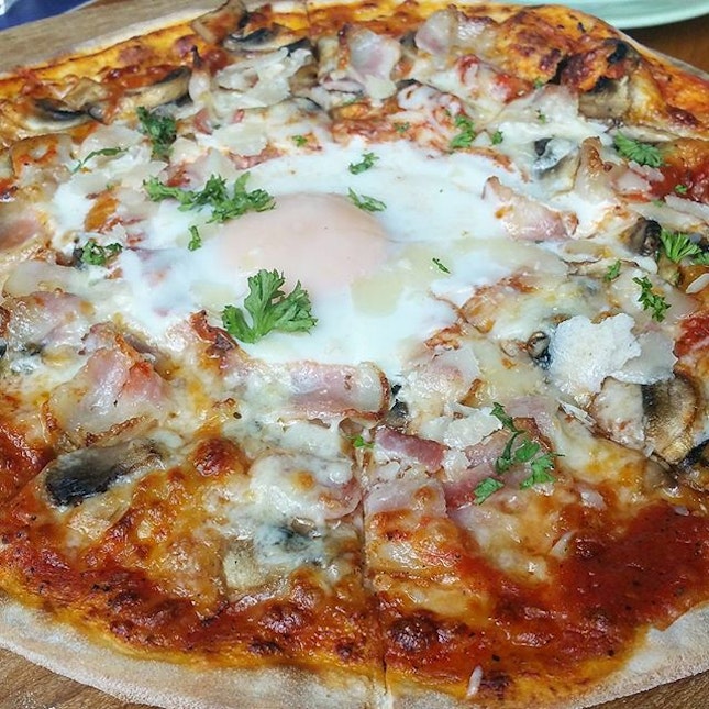 Morning After Thin Crust Pizza: tomato sauce, mozzarella cheese, bacons, mushrooms & soft egg in the middle.