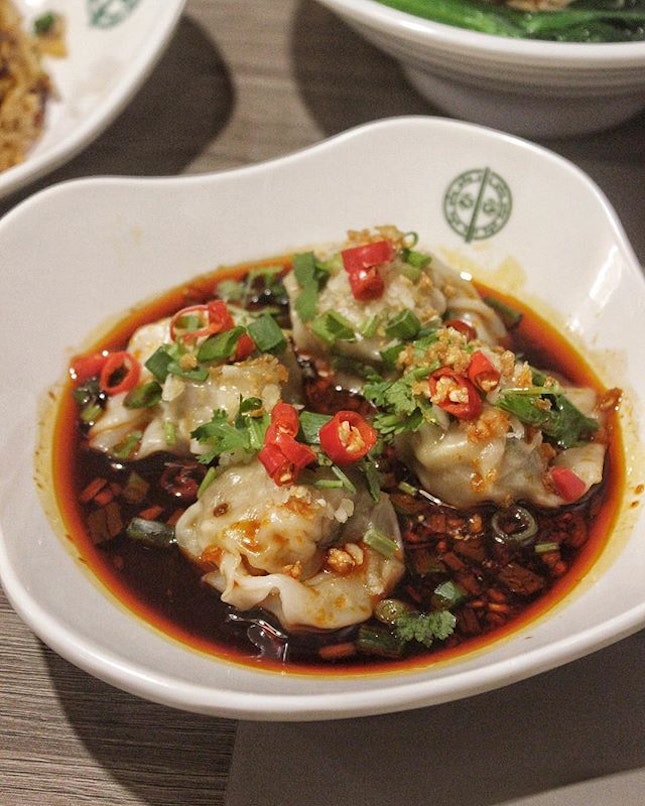 Pork dumplings in hot & spicy sauce ($6.00++) Break a sweat as you pop these meaty morsel enveloped within thin film of wonton skin, pooled in a fiesty puddle of chilli oil & spicy sauce.