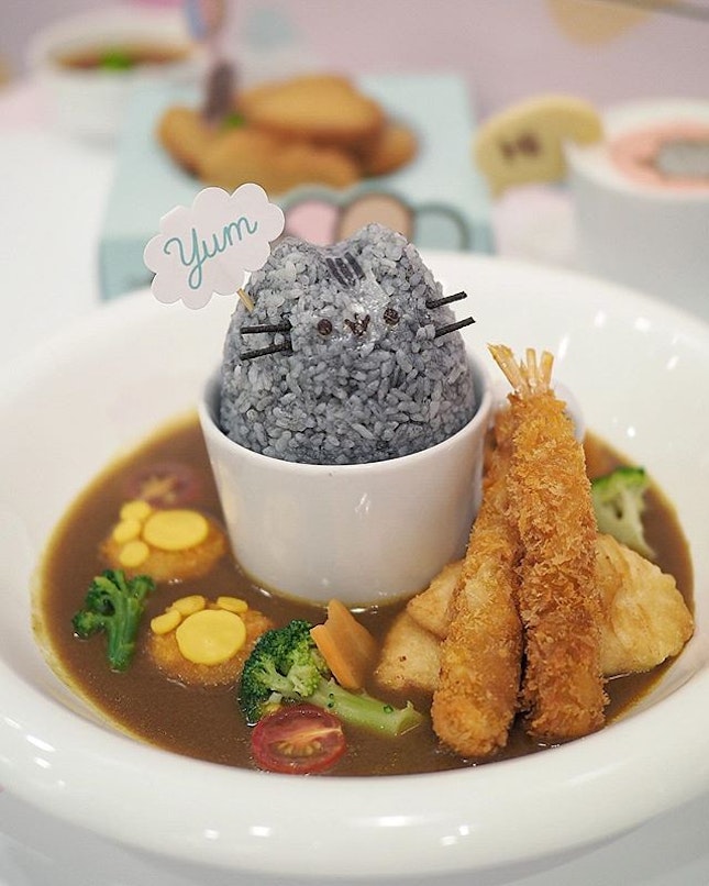 Pusheen Floating Fun Japanese Seafood Curry Rice ($23.90) Japanese bamboo charcoal rice with curry 🍛 , breaded ebi, calamari, scallops and tempura salmon.