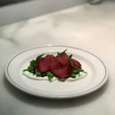 Tuna tartare with crushed green pea salad (A$16/32)