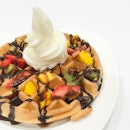 • Original Frozen Yogurt on Waffle • Topped with Fresh fruits and Chocolate sauce • A cool choice for a weather like this •