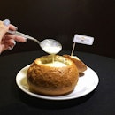 New England Clam Chowder soup served in a crusty bread bowl [$9.20]
.