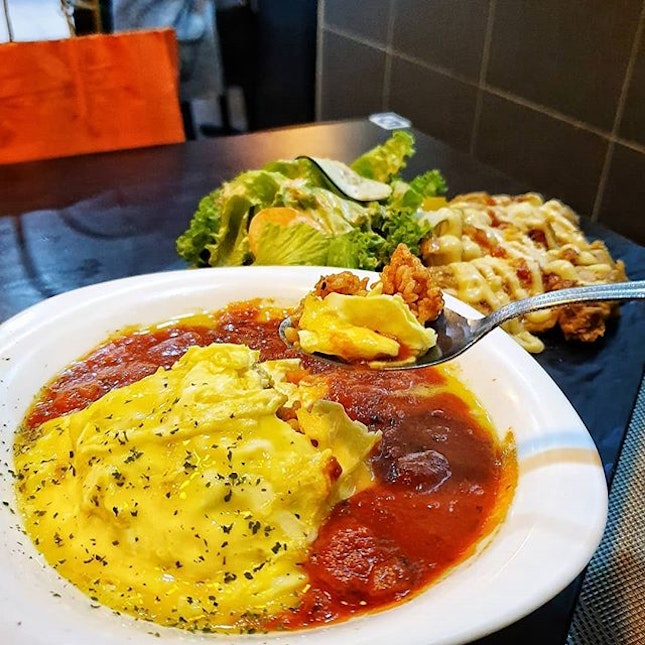 Omurice with Milano style (cheese and tomato) chicken cutlet.