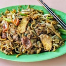 A plate of fried Kway Teow with lots of Wok-Hei and a side of sin!